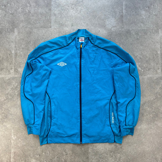 Vintage Umbro Geometra Blue Track Jacket – Size XL – Retro Sportswear